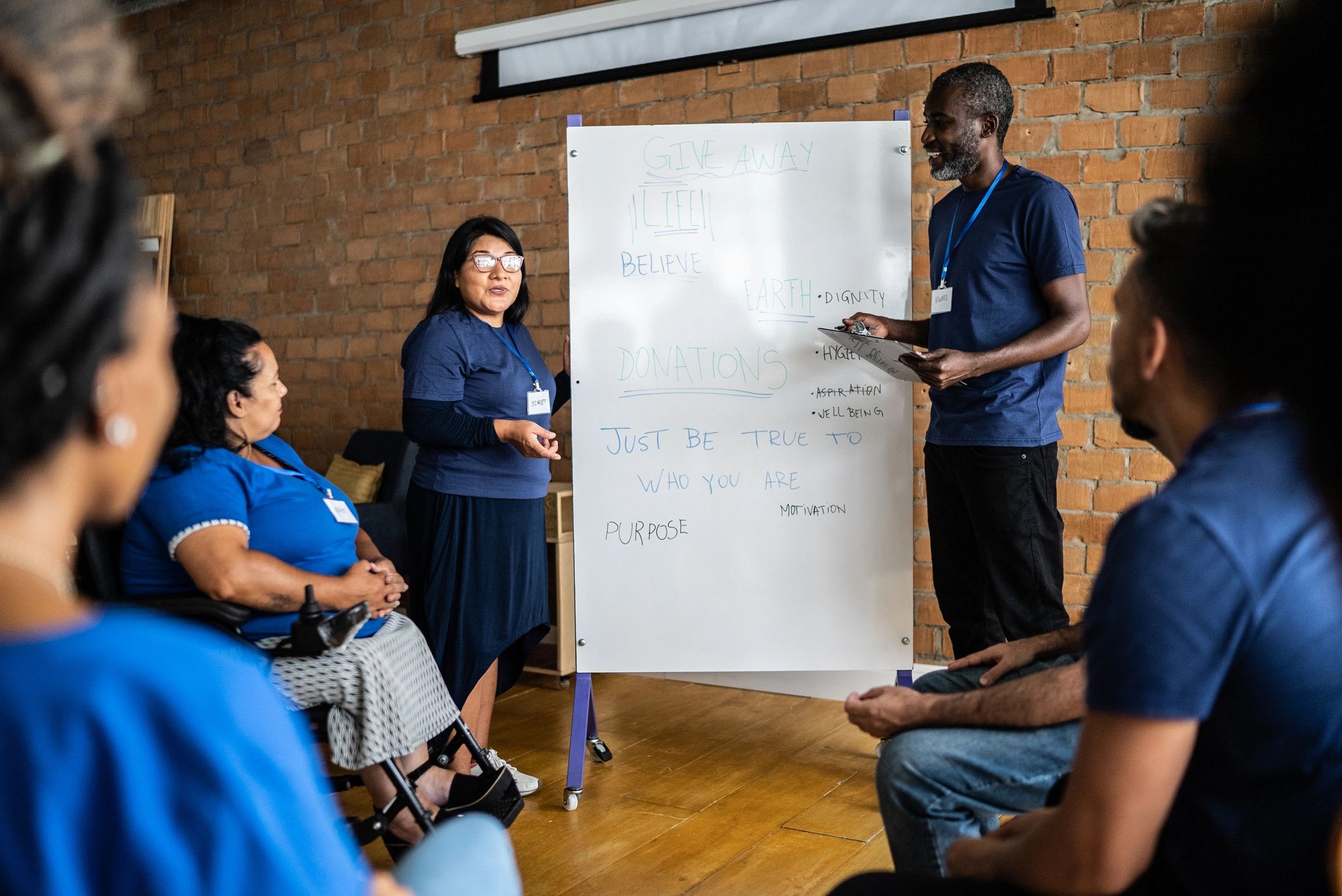 Community health education workshop with participants in discussion