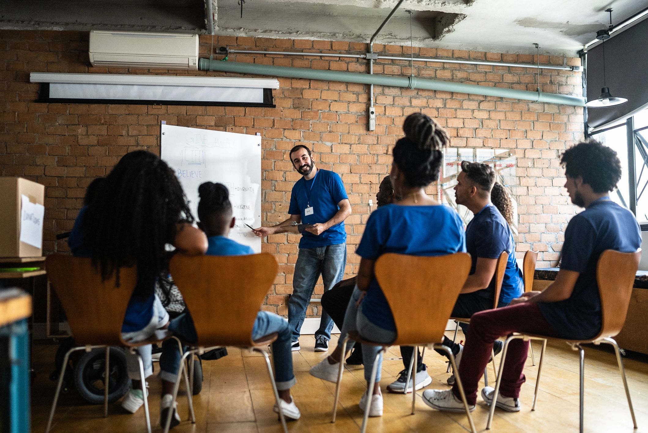 Foundation team member speaking at a community meeting